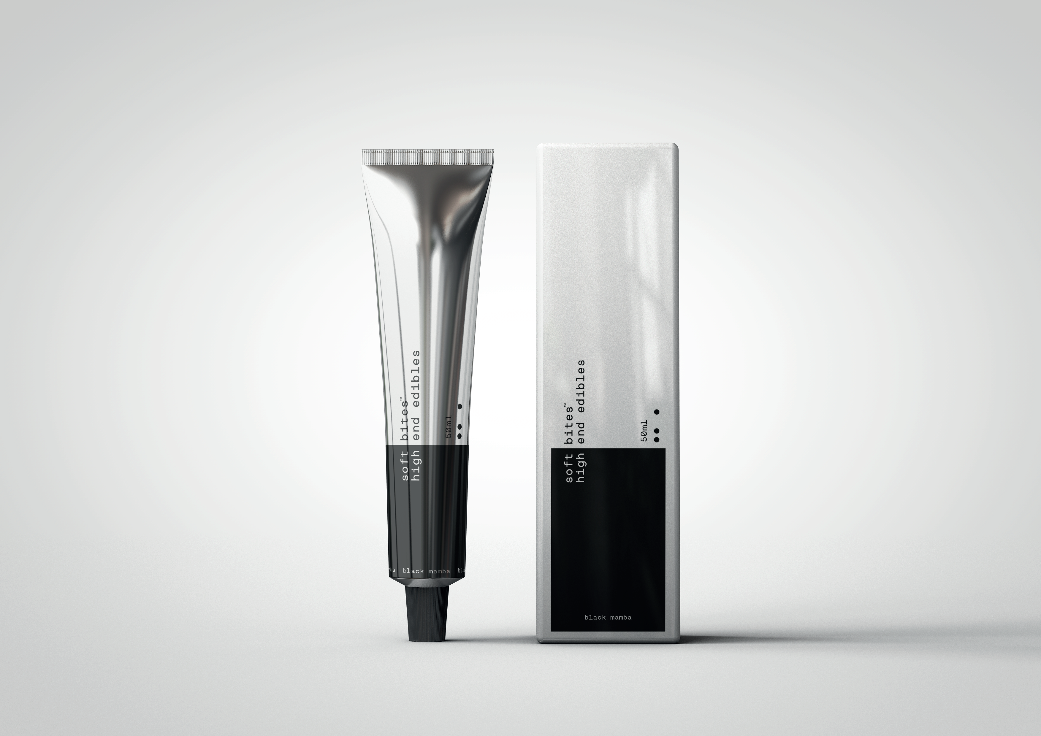 Soft Bites tube and box on a pale studio surface